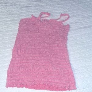 Pink crop-top/tank-top.